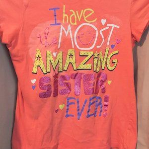 1989 Place Girls T Shirt, Orange "I Have The Most Amazing Sister Ever"